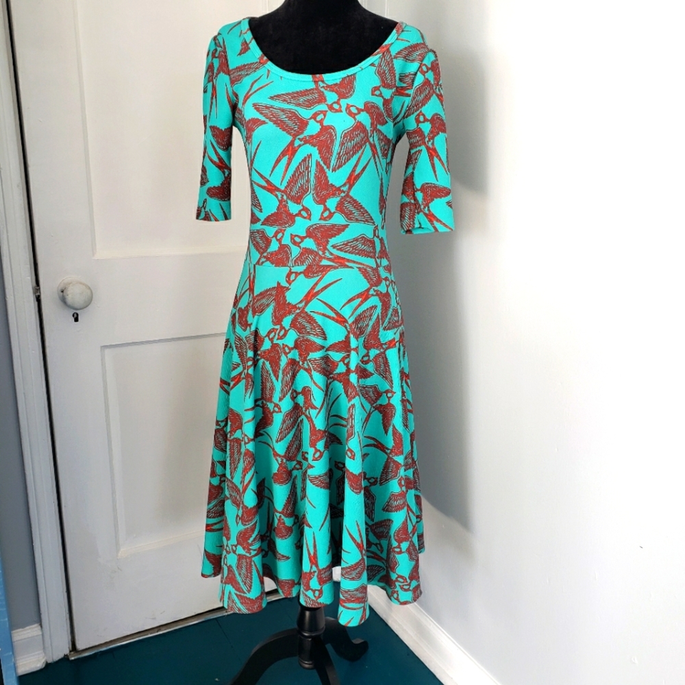 Nicole LulaRoe Teal with red birds, size small swing dress